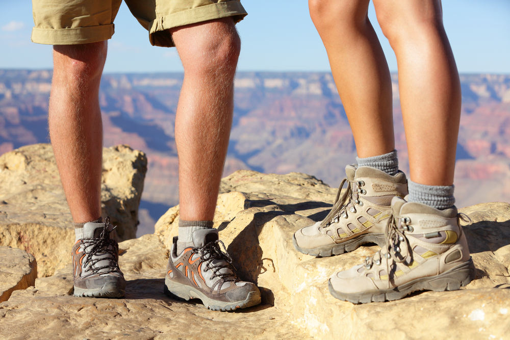 Man and woman hiker in hike boots