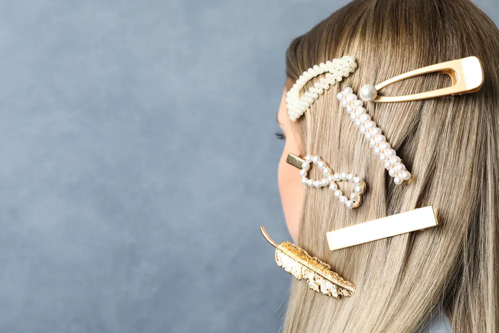 Young woman with beautiful hair clips and pins