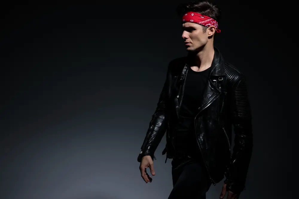 cool guy wearing leather jacket and red bandana