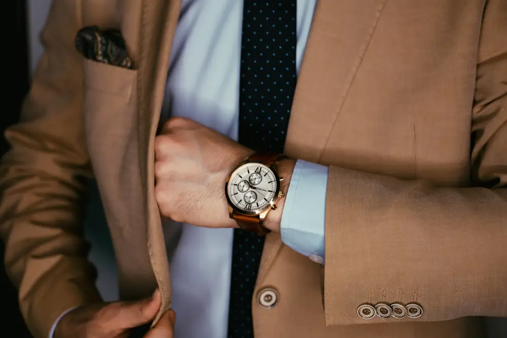 man wearing a luxury watch on his wrist