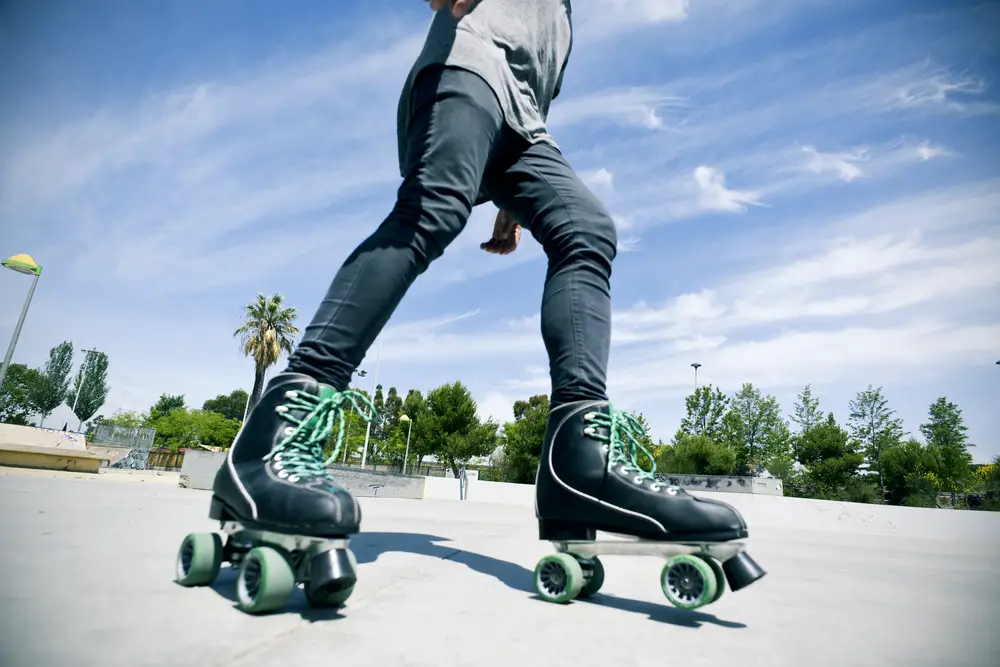 roller skating with quad skates in an outdoors skate park
