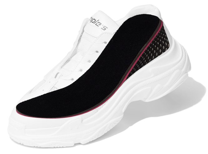 sneaker with a black height increasing insole inside. The insole with velour surface