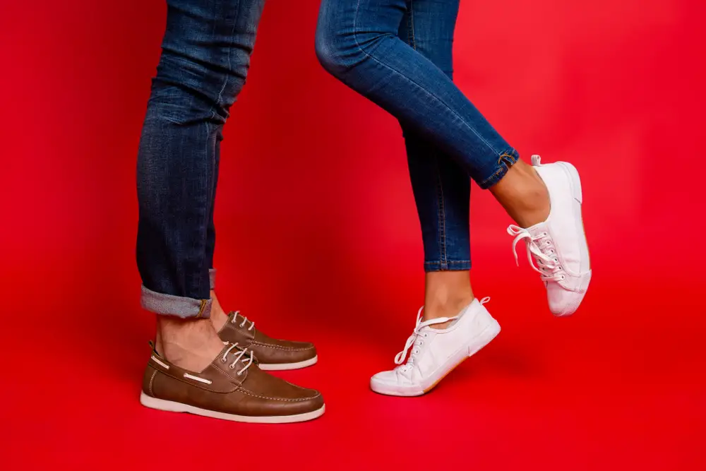 woman and man legs in jeans, pants and shoes